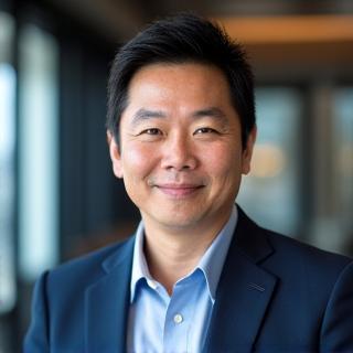 Headshot of Kenji Sato, Lead Coach.